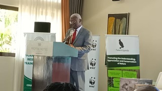 Hon. Tom Butime, Minister of Tourism, Wildlife and Antiquities Hon. Tom Butime, Minister of Tourism, Wildlife and Antiquities